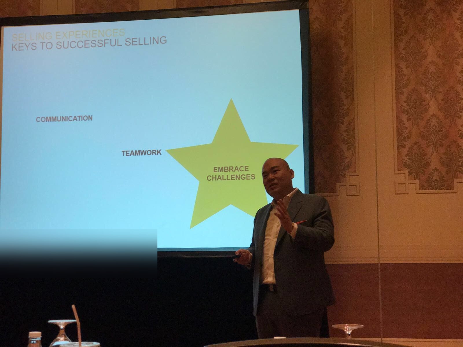 Marcus Lim delivering a keynote on Selling Experiences and the keys to successful selling